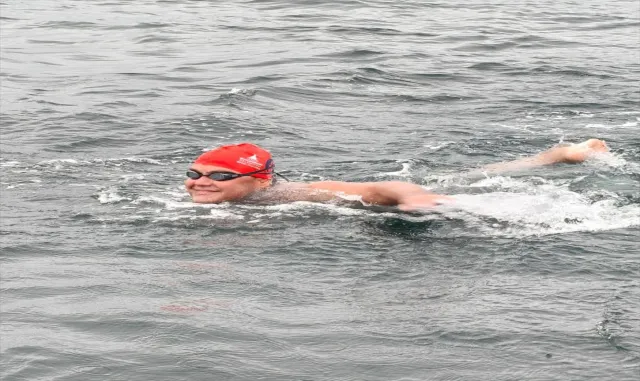 Otizmli ultra maraton yüzücüsü Tuna Tunca, Kuzey Kanalı’nı geçti Otizmli ultra maraton yüzücüsü Tuna Tunca, Kuzey Kanalı’nı geçti